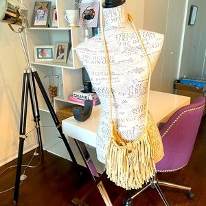 Frye Fringed bag in Natural. Mint condition. Never used. Bag is spotless.